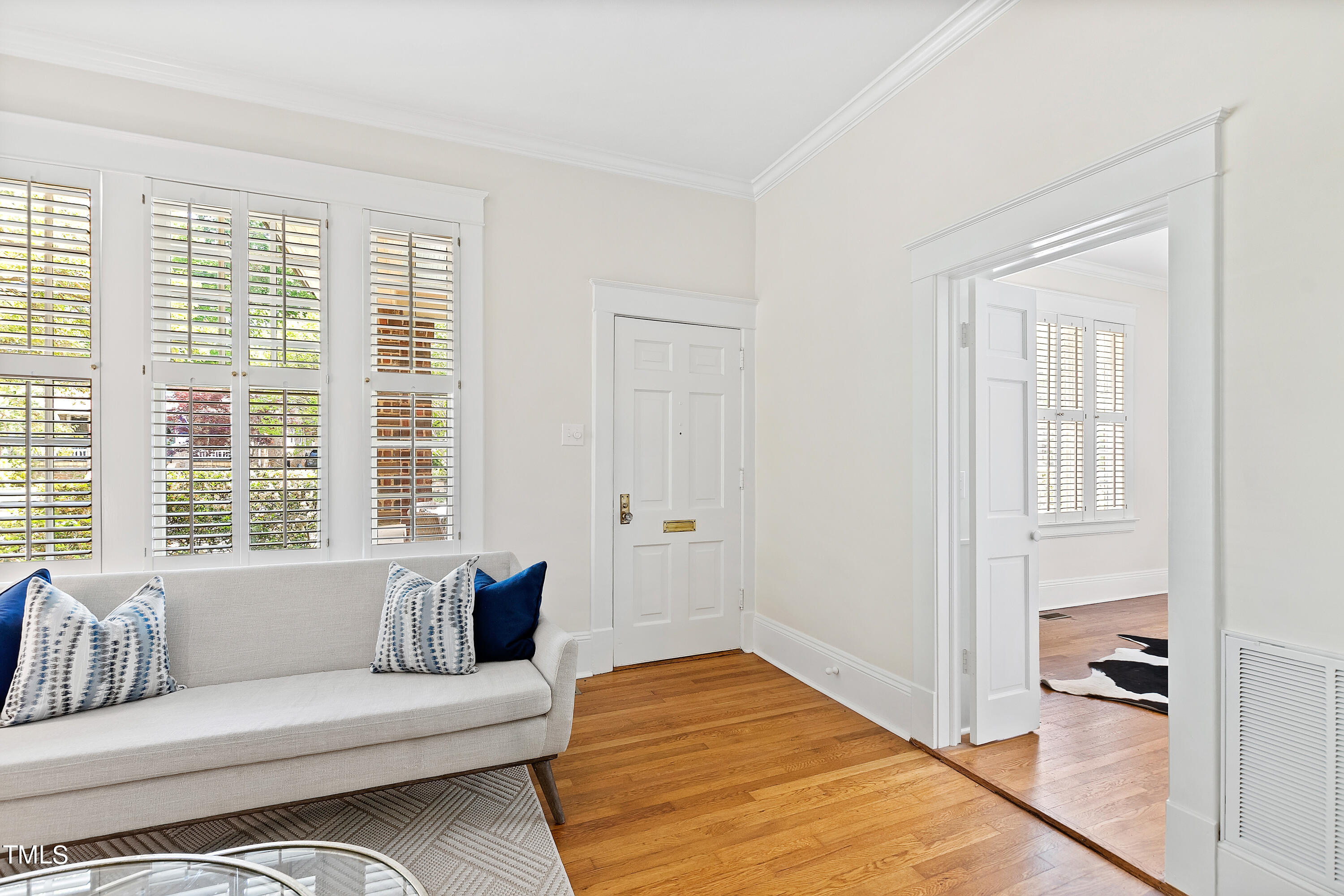 1803 Fairview Road Raleigh, NC 27608 - Photo 5 of 49 a living room with furniture and a large window