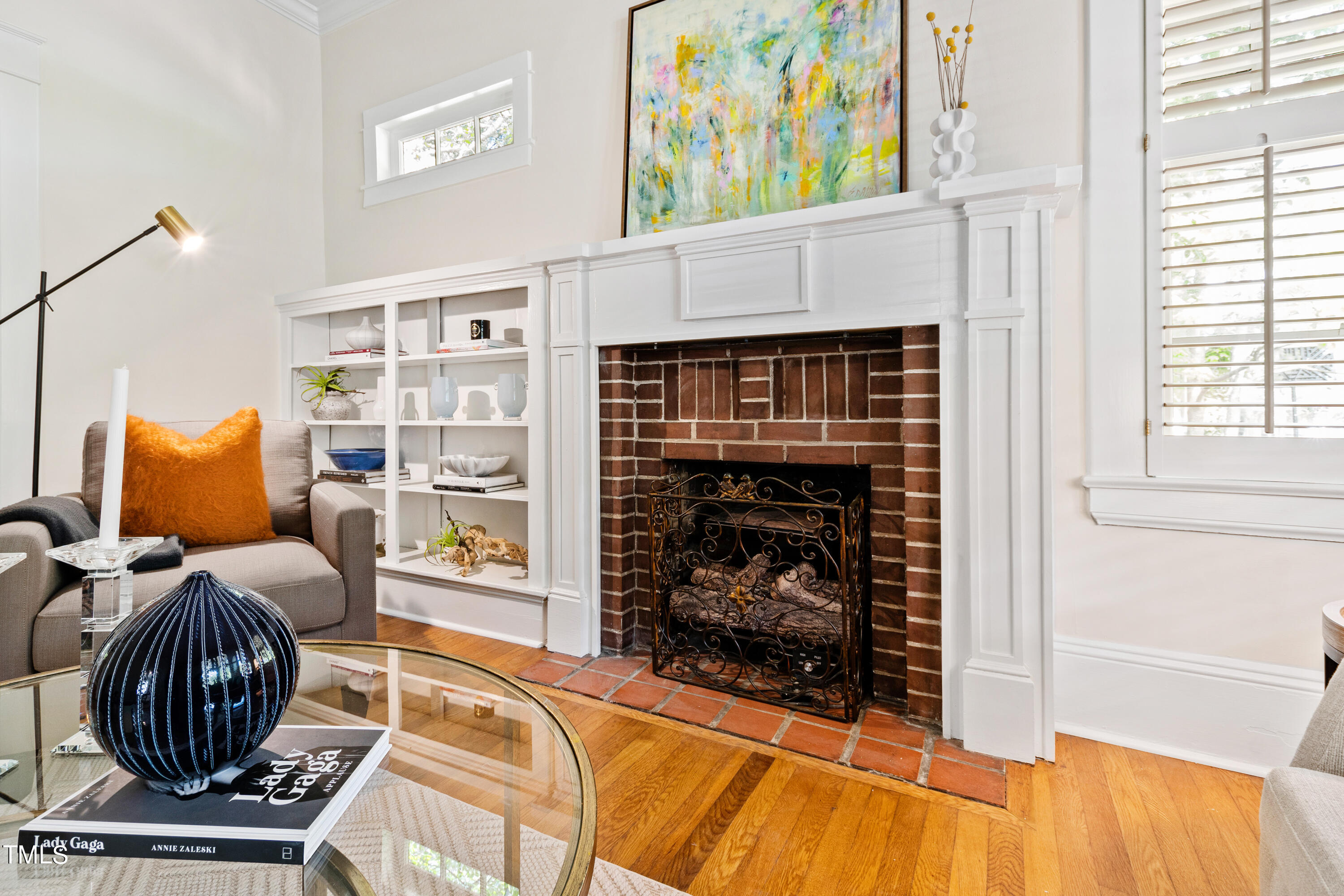 1803 Fairview Road Raleigh, NC 27608 - Photo 8 of 49 a living room with furniture and a fireplace