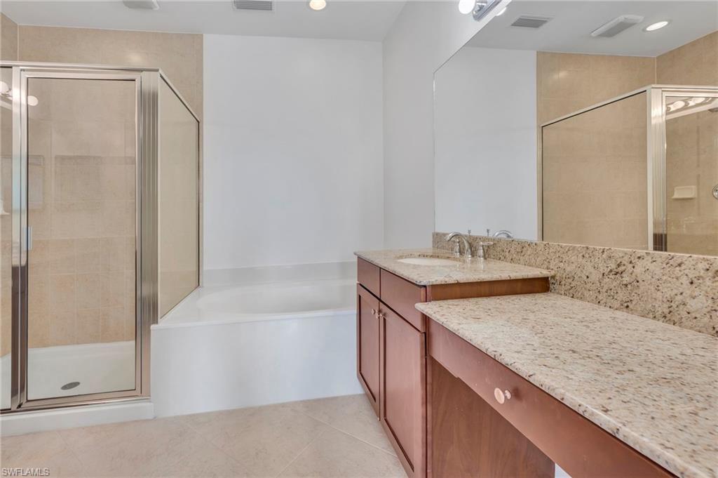 6505 Monterey Point, Unit 202 Naples, FL 34105 - Photo 10 of 30 Great size master bath with separate sinks and makeup area.