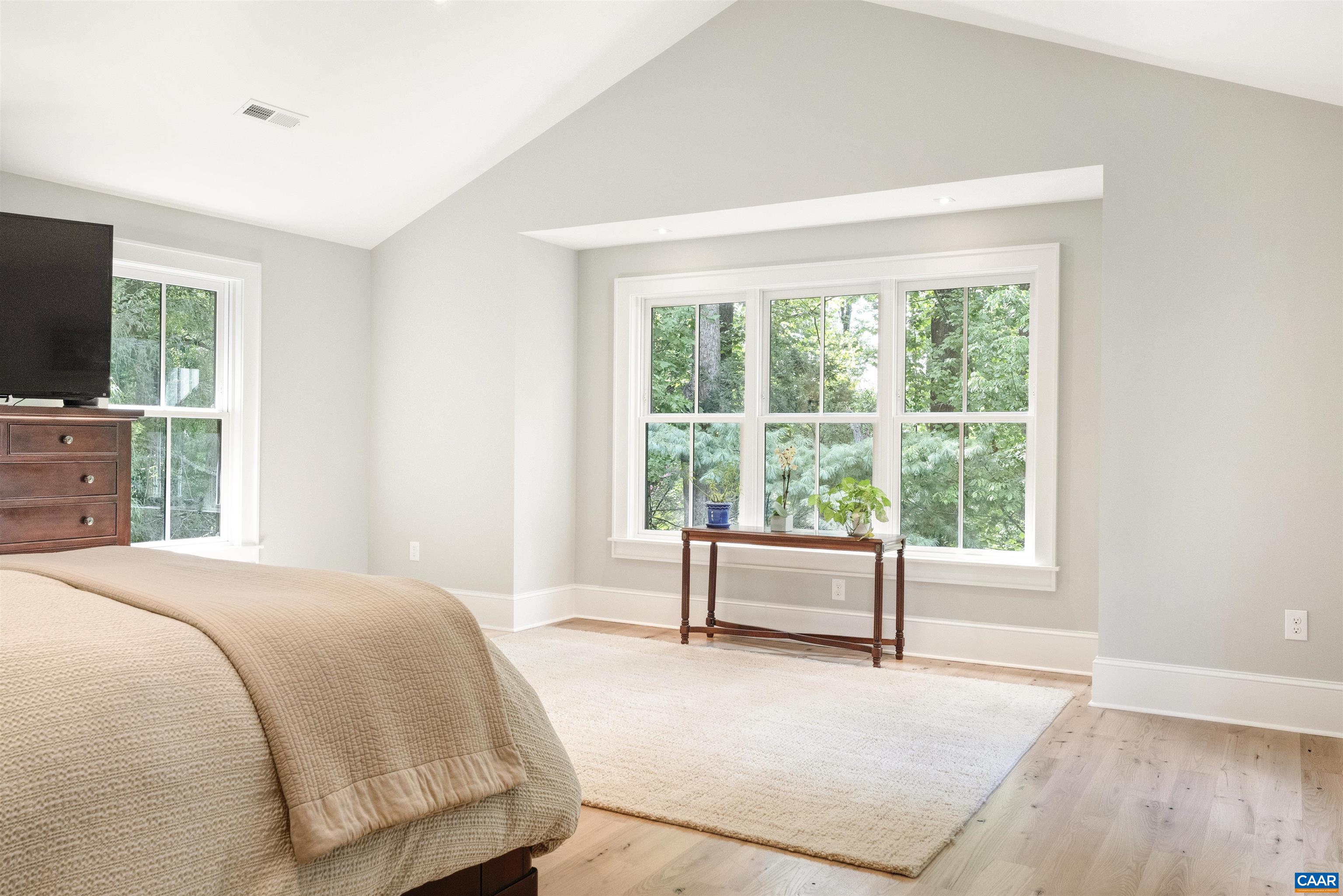 1824 Winston Road Charlottesville, VA 22903 - Photo 25 of 46 a spacious bedroom with a bed and large window
