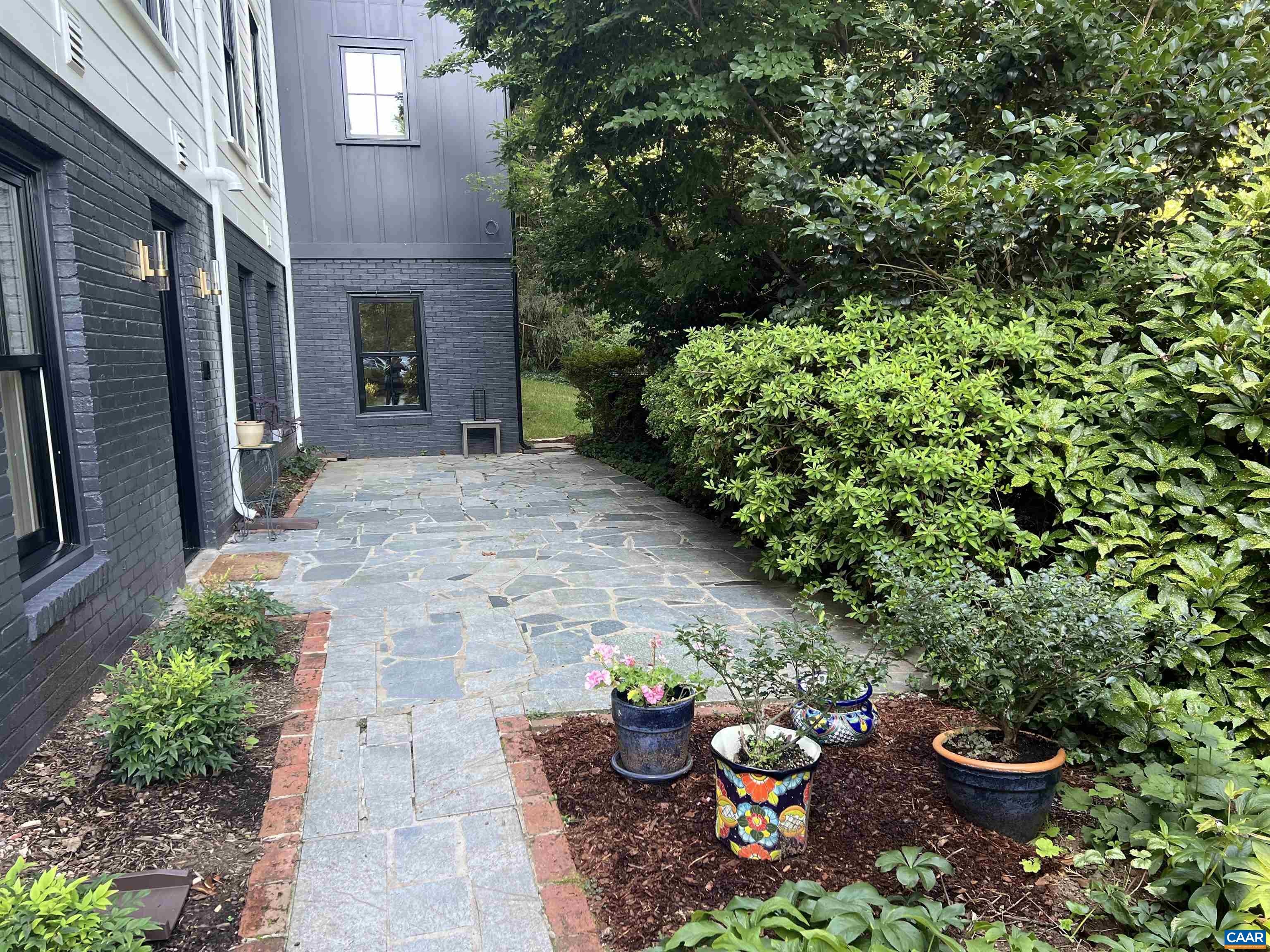 1824 Winston Road Charlottesville, VA 22903 - Photo 44 of 46 a view of a backyard with plants and a patio