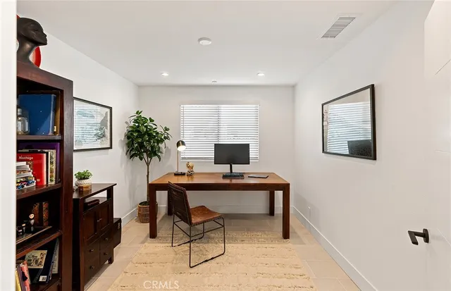 a view of a balcony with chairs