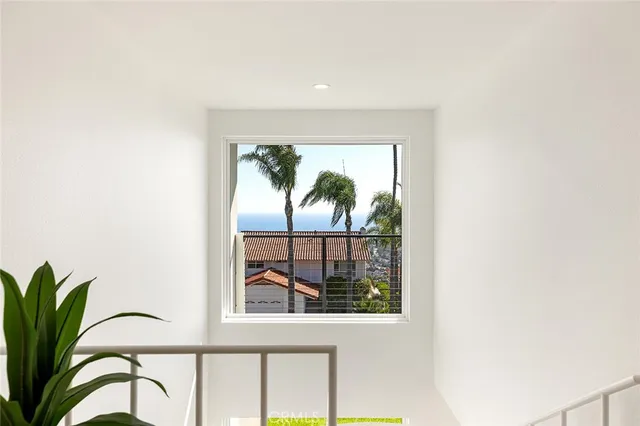 a bathroom with a shower sink and mirror