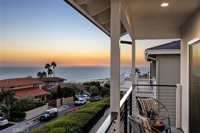 a view of a terrace with a garden and mountain view