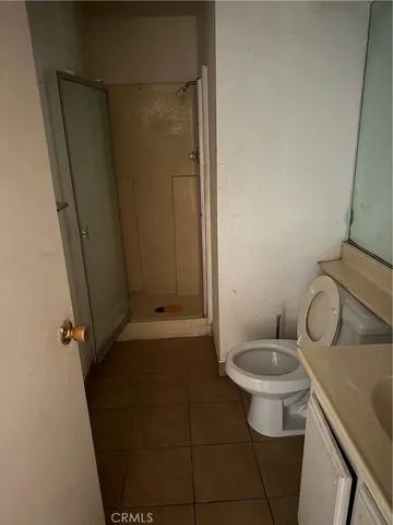 a bathroom with a toilet and a sink