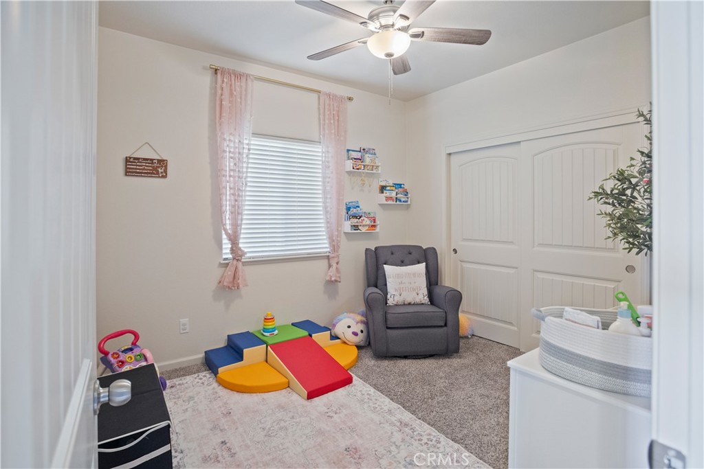 4440 Lindsey Lane Merced, CA 95348 - Photo 16 of 23 a living room with furniture and a window