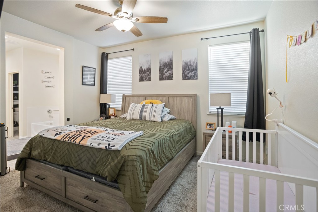 4440 Lindsey Lane Merced, CA 95348 - Photo 18 of 23 a bedroom with a bed and a window