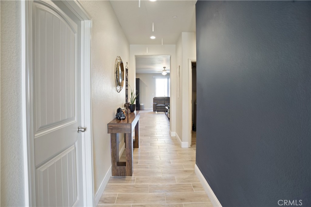 4440 Lindsey Lane Merced, CA 95348 - Photo 3 of 23 a view of hallway with wooden floor