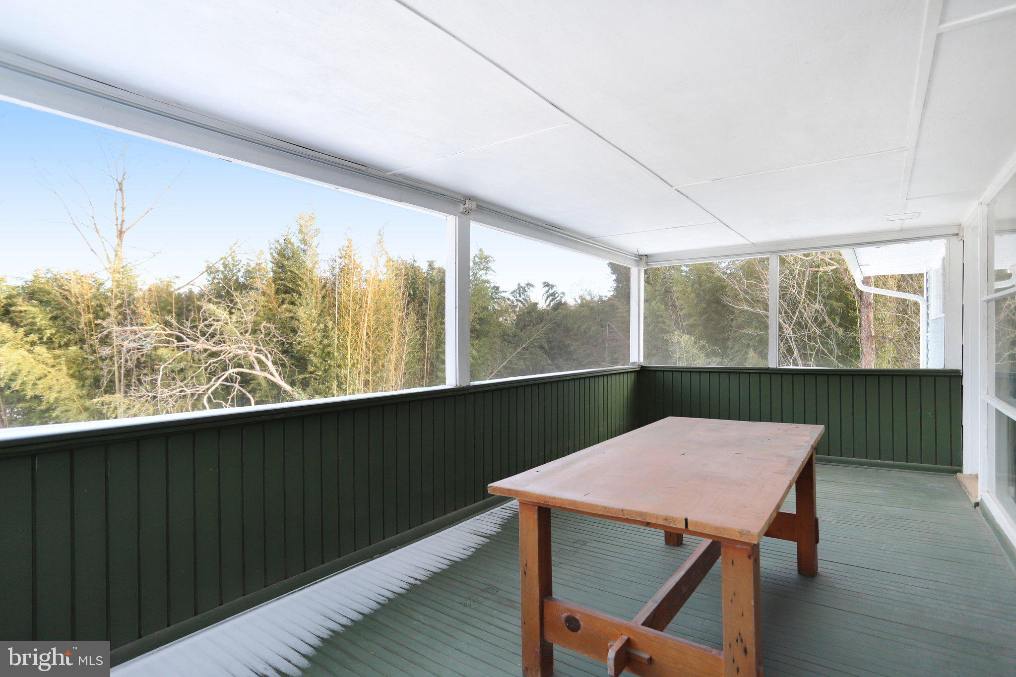 841 Bowie Road Rockville, MD 20852 - Photo 12 of 18 a view of a dining room with furniture window and wooden floor