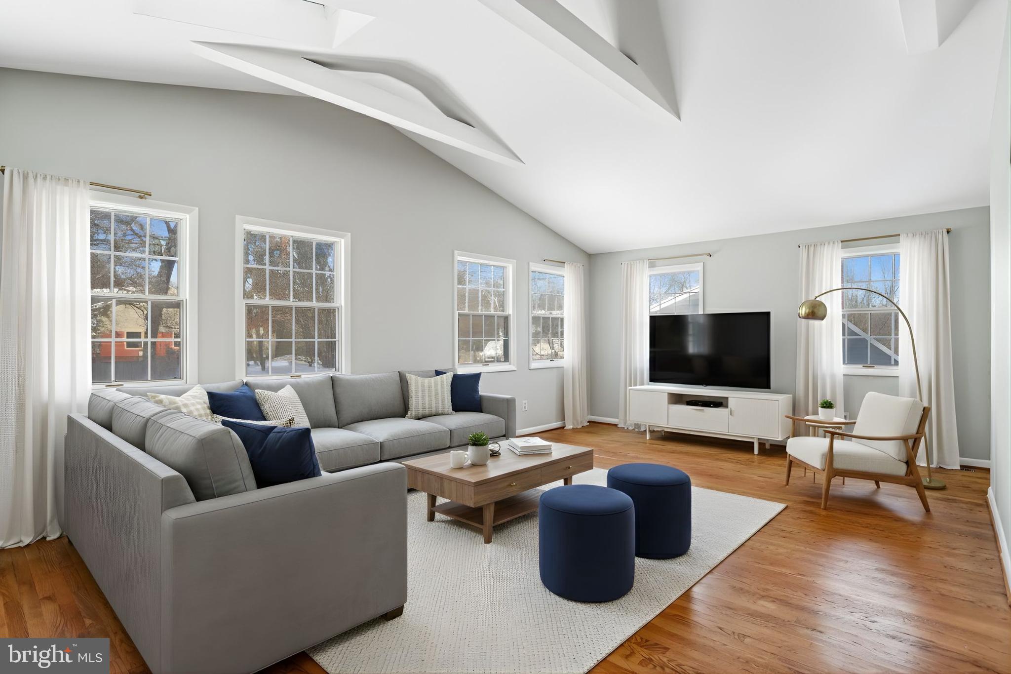 841 Bowie Road Rockville, MD 20852 - Photo 2 of 18 a living room with furniture and a flat screen tv