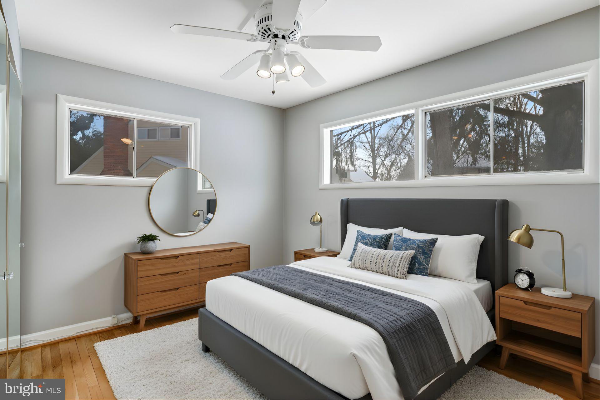 841 Bowie Road Rockville, MD 20852 - Photo 6 of 18 a bedroom with a large bed and a window