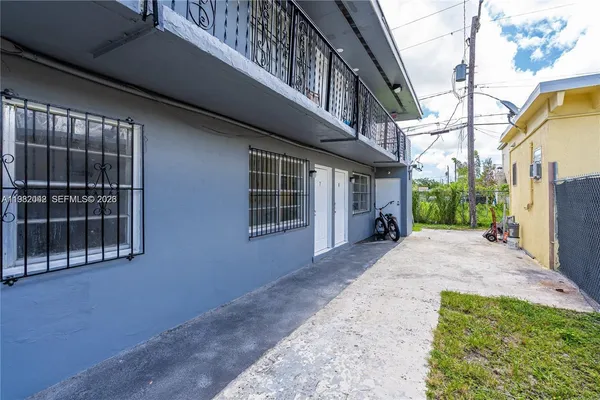a view of a house with a garden