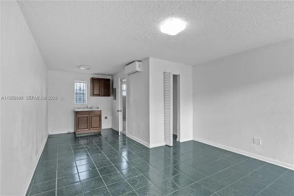 an empty room with an entryway