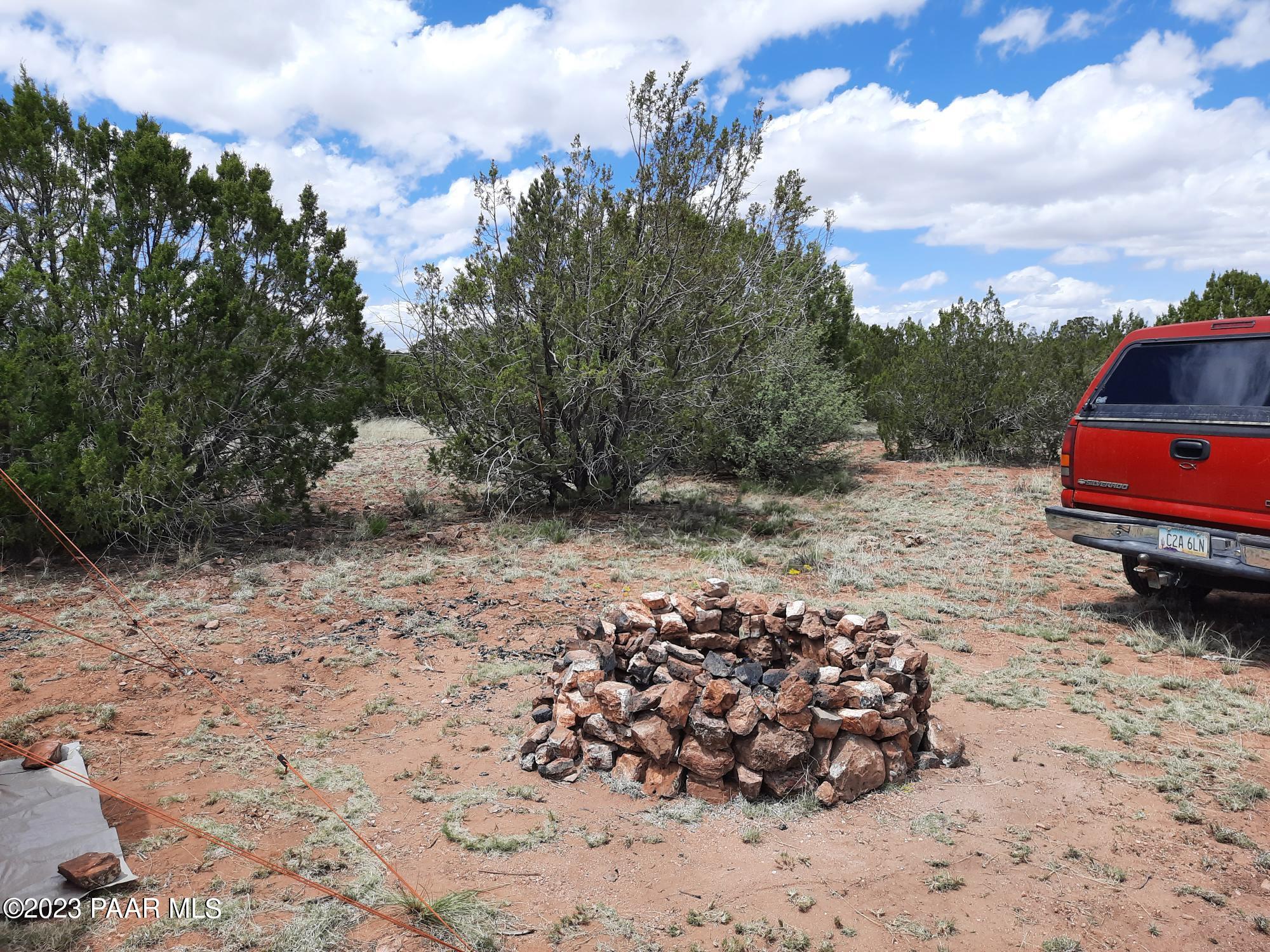 103 B Antelope Run Road Seligman, AZ 86337 - Photo 3 of 17 a view of a backyard of the house