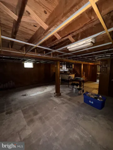 a view of parking garage with cars