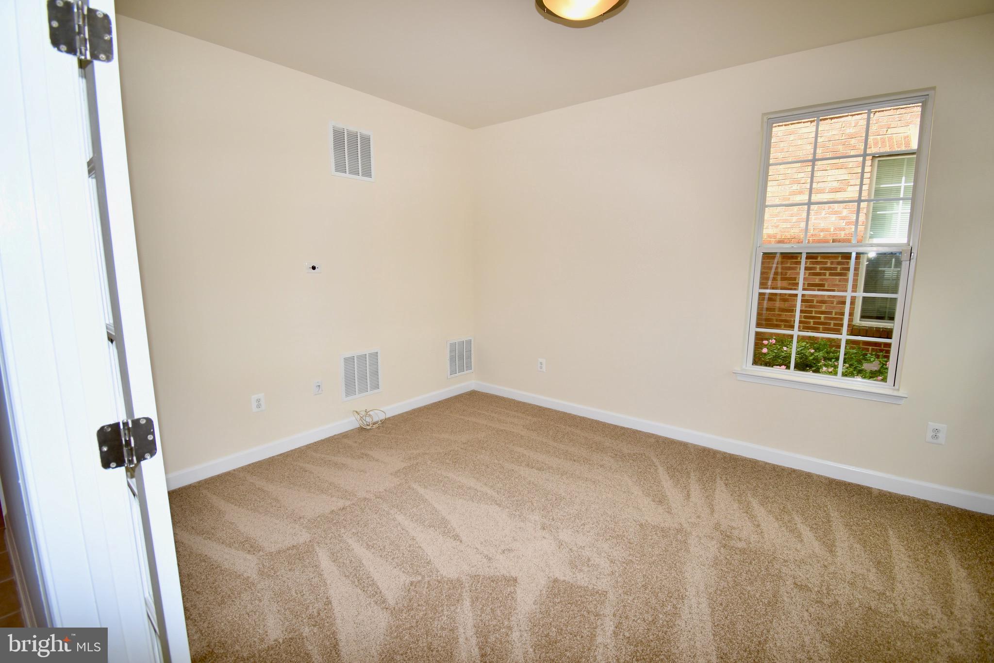 11665 Leesborough Circle Silver Spring, MD 20902 - Photo 33 of 82 an empty room with windows