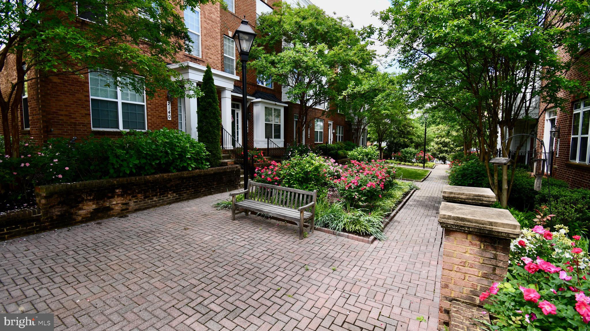 11665 Leesborough Circle Silver Spring, MD 20902 - Photo 41 of 82 a view of a garden with flowers and trees