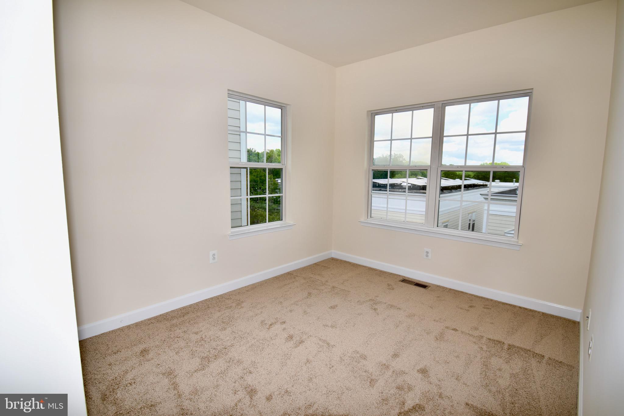 11665 Leesborough Circle Silver Spring, MD 20902 - Photo 53 of 82 an empty room with windows