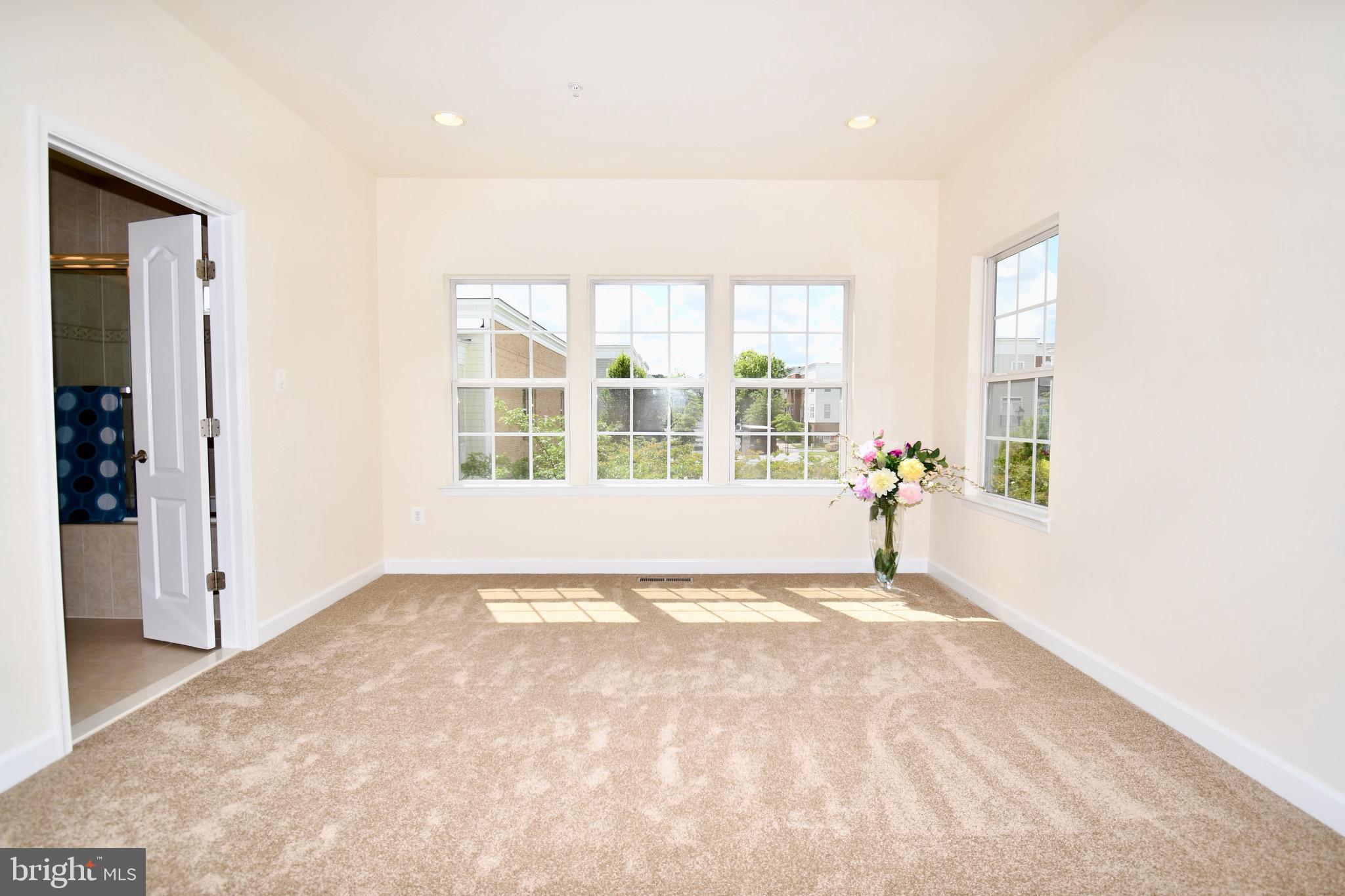 11665 Leesborough Circle Silver Spring, MD 20902 - Photo 72 of 82 a view of an empty room with a window