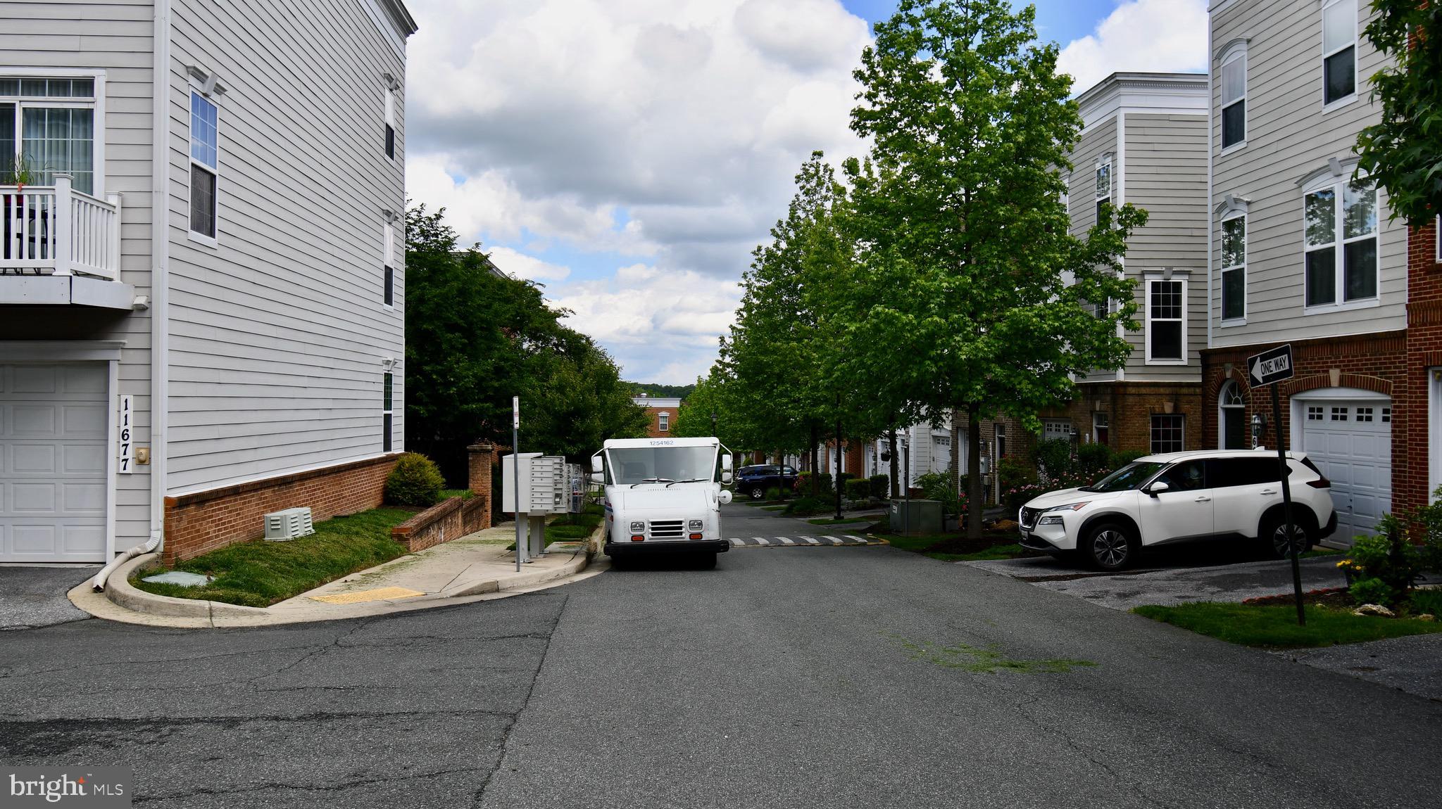 11665 Leesborough Circle Silver Spring, MD 20902 - Photo 82 of 82 a view of a parked cars in front of a building
