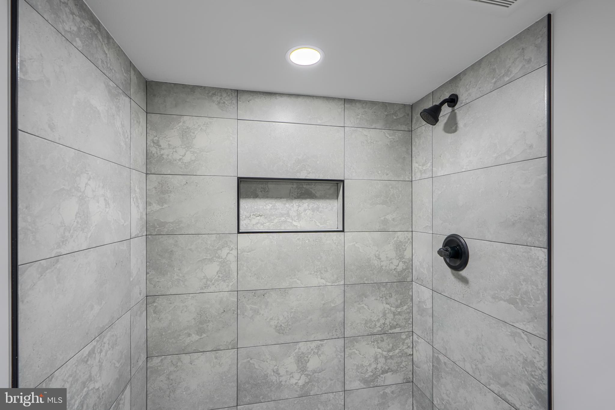 3410 Pinkney Road Baltimore, MD 21215 - Photo 44 of 55 a bathroom with a shower