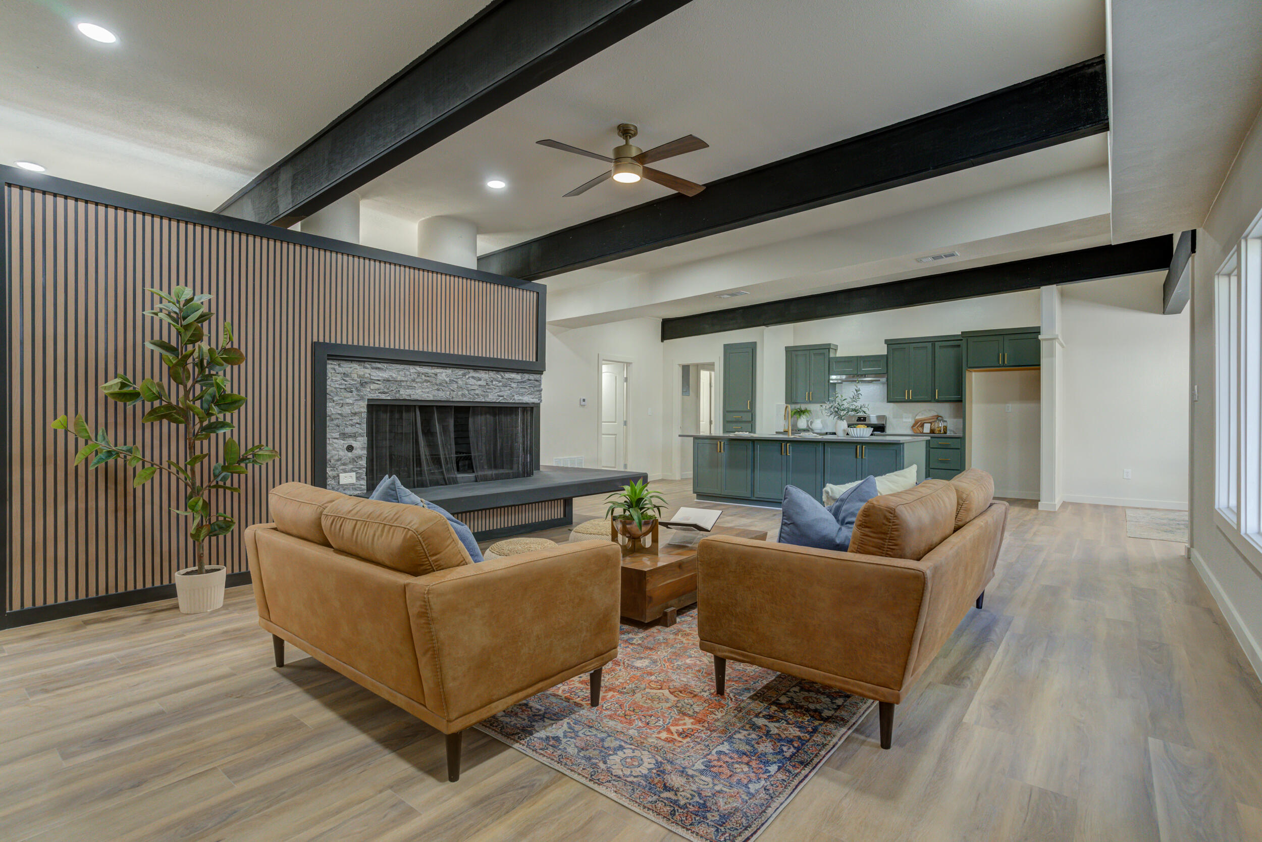 2218 58th Street Lubbock, TX 79412 - Photo 11 of 66 a living room with furniture and a fireplace