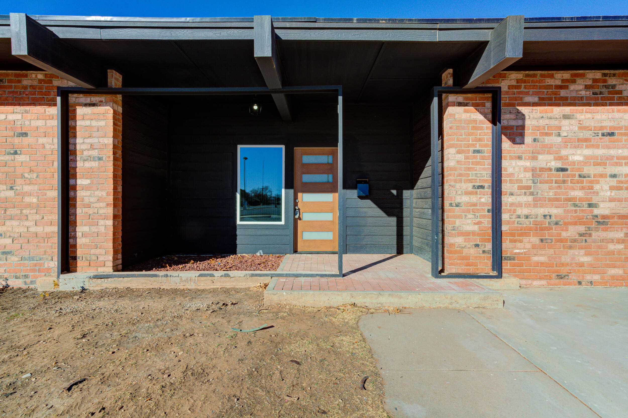 2218 58th Street Lubbock, TX 79412 - Photo 4 of 66 a view of an entrance of the house