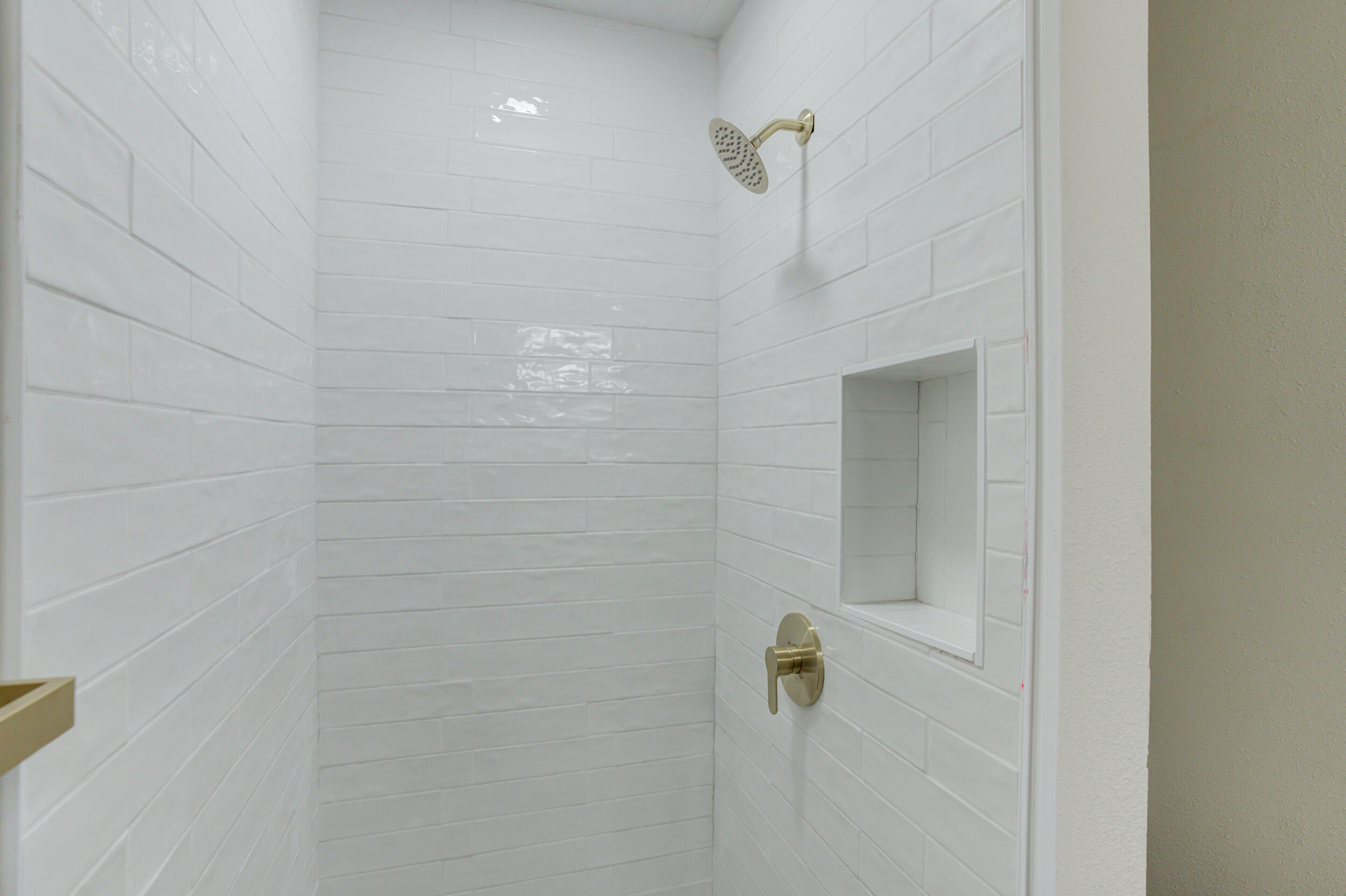 2218 58th Street Lubbock, TX 79412 - Photo 50 of 66 a bathroom with a shower