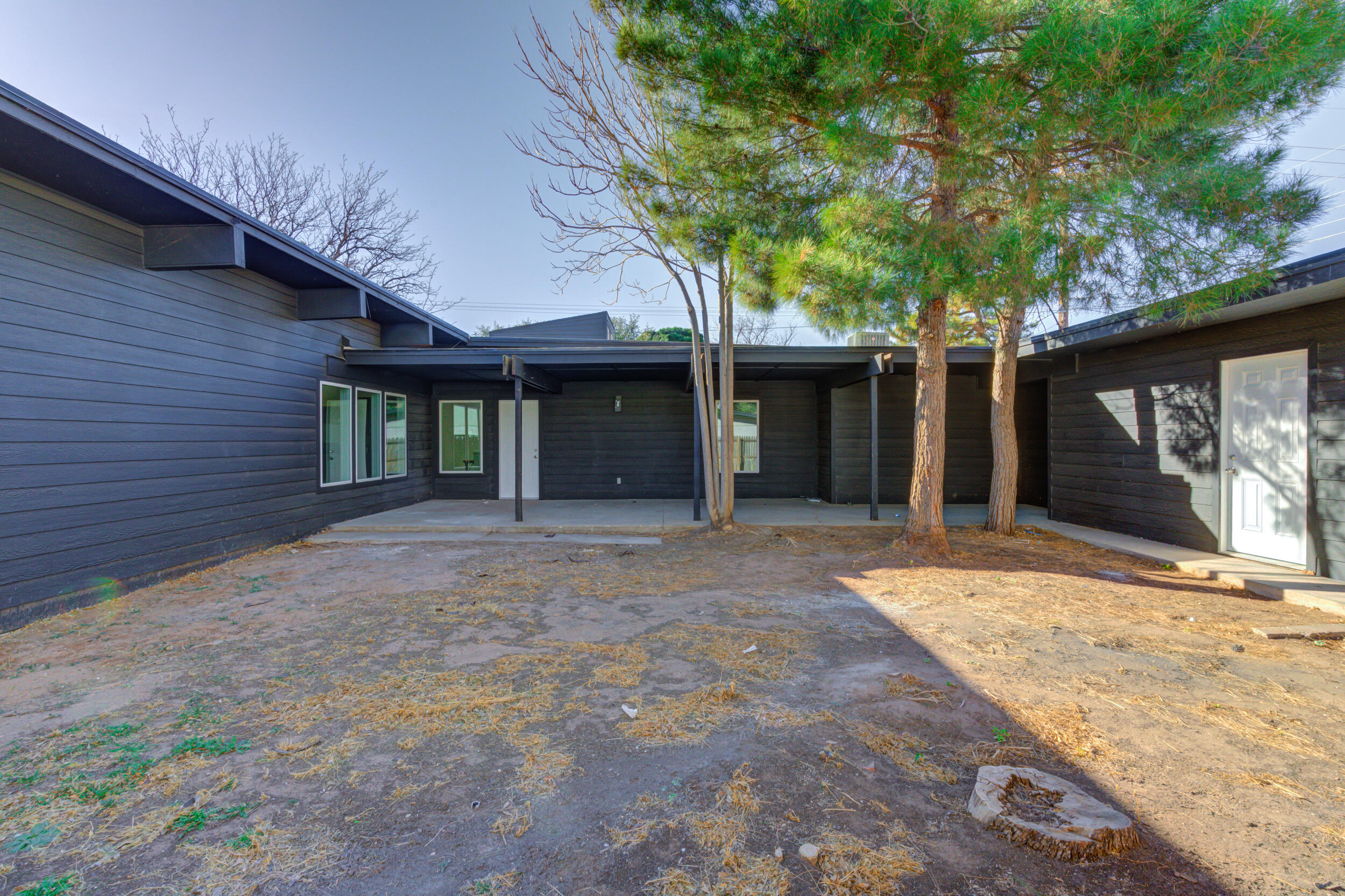 2218 58th Street Lubbock, TX 79412 - Photo 63 of 66 a view of a house with a tree in front of it