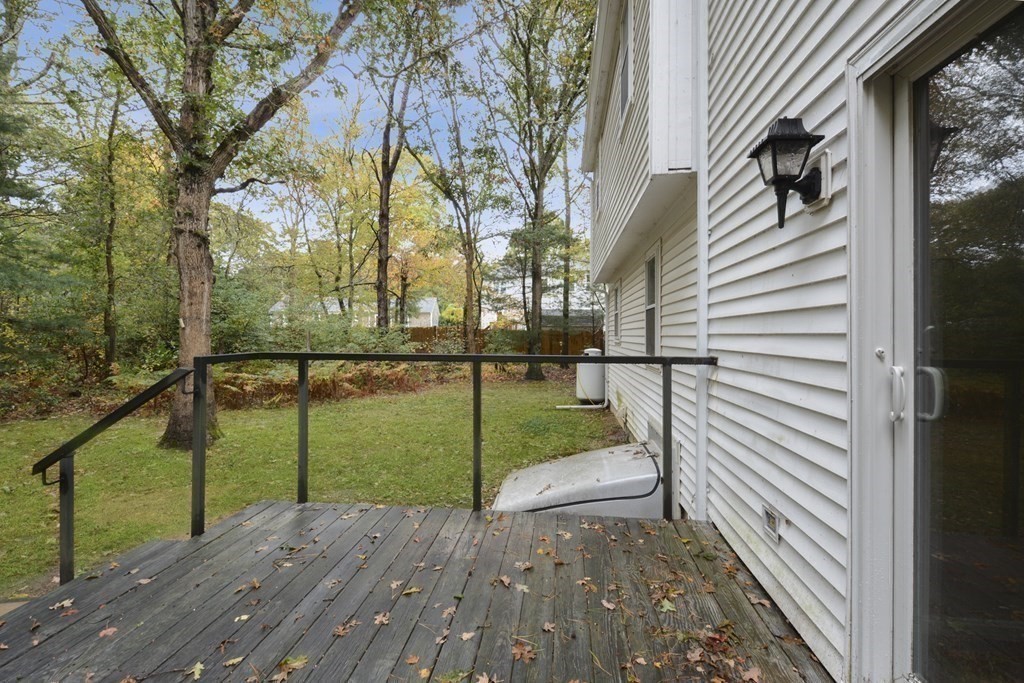 499 Skunknet Road Barnstable, MA 02632 - Photo 13 of 16 a view of a deck with a backyard