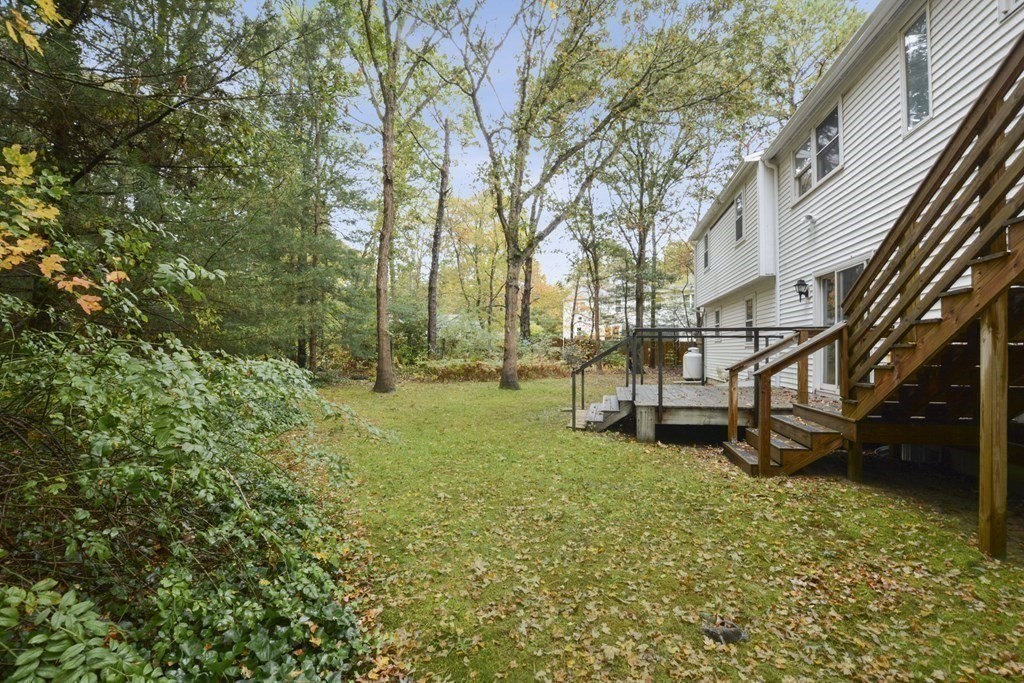 499 Skunknet Road Barnstable, MA 02632 - Photo 16 of 16 a view of a house with a yard