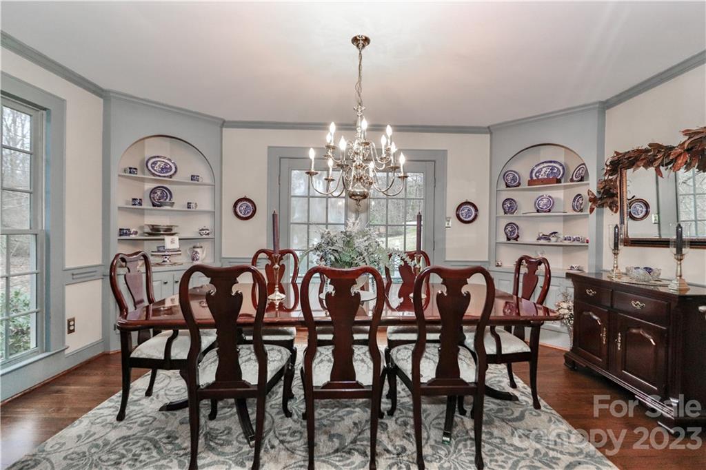 415 Westchester Road Statesville, NC 28625 - Photo 12 of 48 a view of a dining room with furniture and chandelier