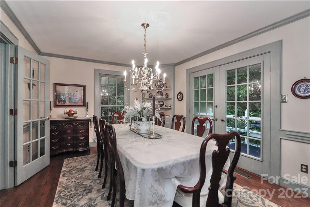 415 Westchester Road Statesville, NC 28625 - Photo 13 of 48 a view of a dining room with furniture window and wooden floor