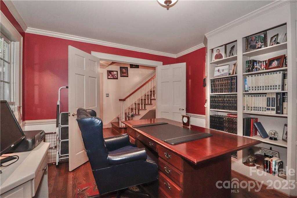 415 Westchester Road Statesville, NC 28625 - Photo 15 of 48 a room with furniture and a book shelf
