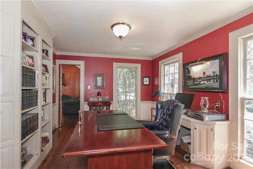 415 Westchester Road Statesville, NC 28625 - Photo 16 of 48 a room with furniture a flat screen tv and a refrigerator