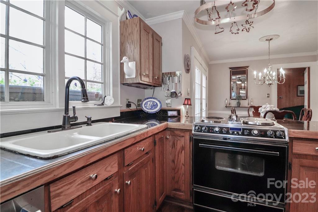 415 Westchester Road Statesville, NC 28625 - Photo 19 of 48 a kitchen with a stove and a sink