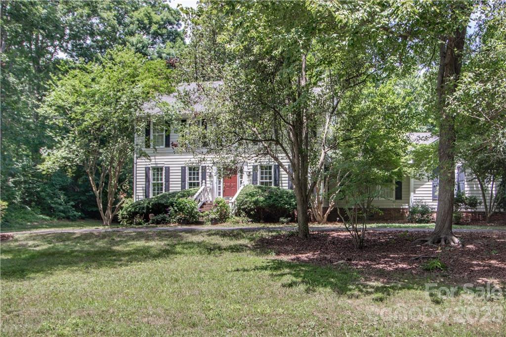 415 Westchester Road Statesville, NC 28625 - Photo 2 of 48 a view of a brick house with a yard
