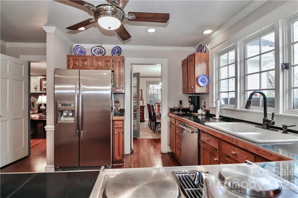 415 Westchester Road Statesville, NC 28625 - Photo 21 of 48 a kitchen with stainless steel appliances granite countertop a refrigerator and a sink