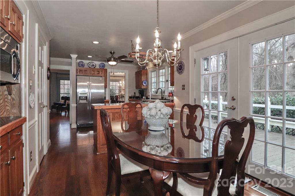 415 Westchester Road Statesville, NC 28625 - Photo 23 of 48 a view of a dining room with furniture window and wooden floor