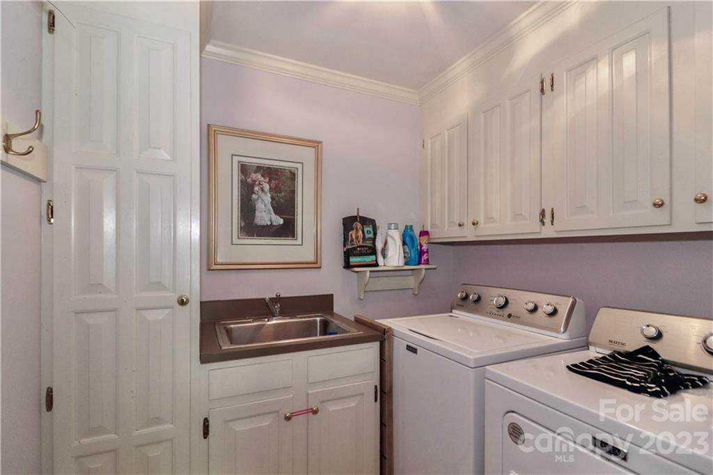 415 Westchester Road Statesville, NC 28625 - Photo 28 of 48 a utility room with dryer and washer