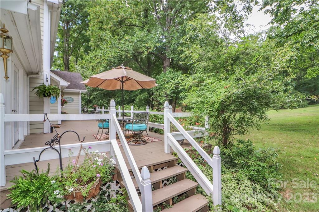 415 Westchester Road Statesville, NC 28625 - Photo 47 of 48 a view of a patio with chairs and a yard