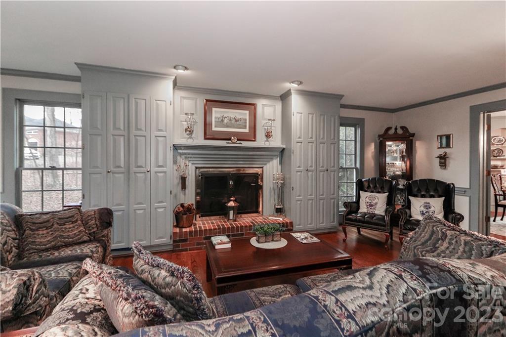 415 Westchester Road Statesville, NC 28625 - Photo 10 of 48 a living room with furniture large window and a fireplace