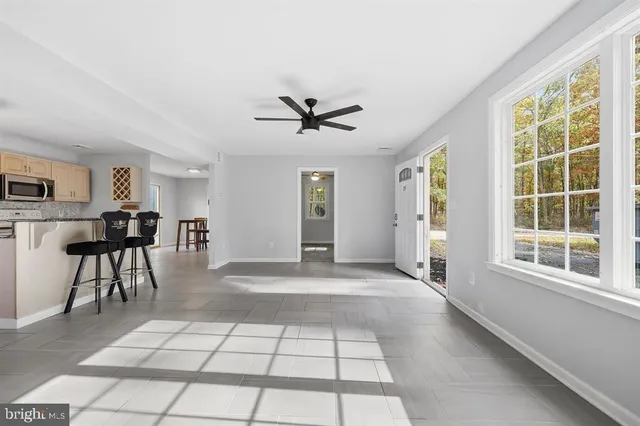 a view of workspace with furniture and window