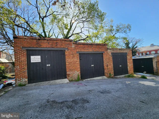 a view of a house with a tree