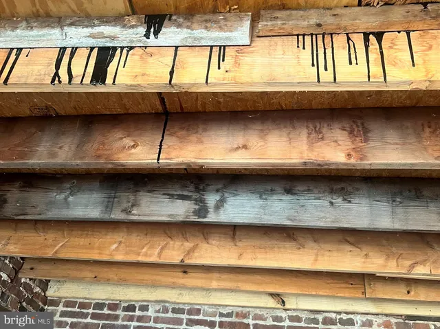 a view of a swimming pool with an outdoor seating