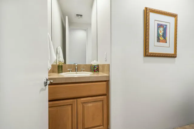 a bedroom with furniture and a fireplace