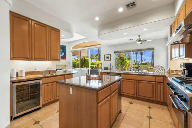 a large bathroom with a sink a large mirror and a shower