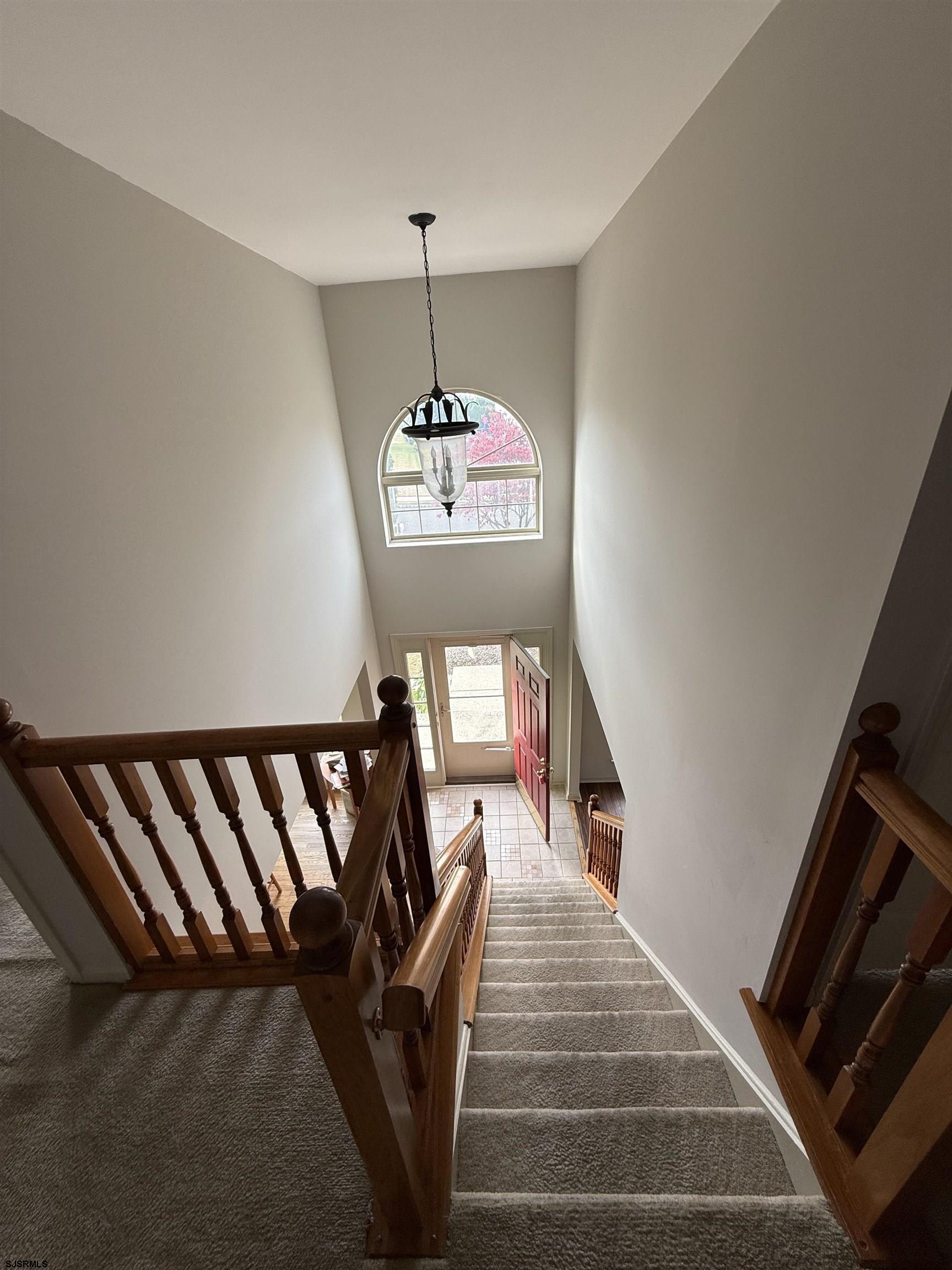 3 Teaberry Lane Riverside, NJ 08075 - Photo 3 of 11 a view of entryway and hall with wooden floor