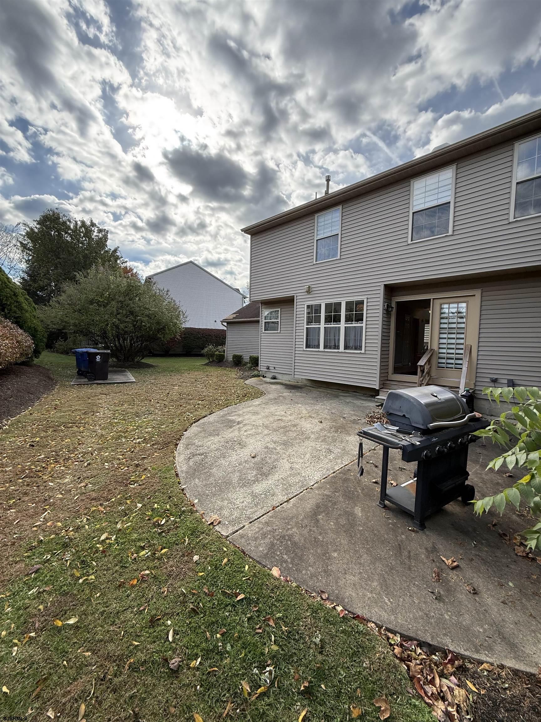 3 Teaberry Lane Riverside, NJ 08075 - Photo 10 of 11 a backyard of a house with yard barbeque oven and outdoor seating