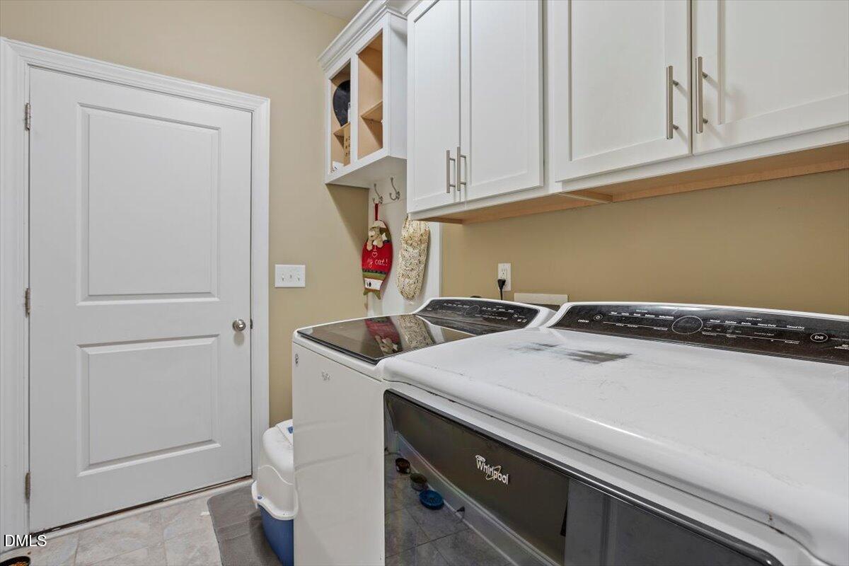 1001 Bellewood Farms Road Raleigh, NC 27603 - Photo 31 of 39 a utility room with dryer and washer